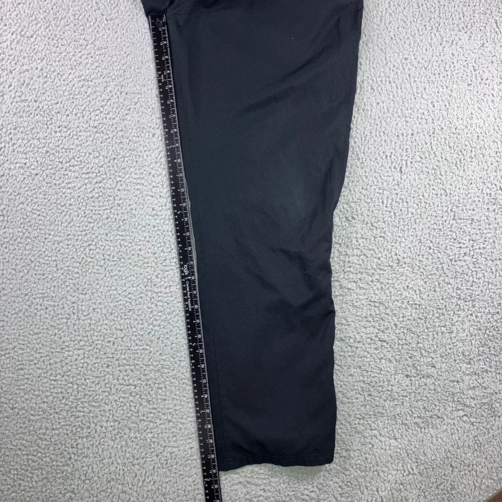 Under Armour Track Pants Men Medium 28x31 Loose Wide Leg Zip Ankle Spellout Logo
